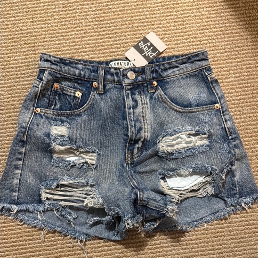 Destroyed denim shorts